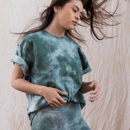 Sage green tie dye tee with a watercolor aesthetic in 100% cotton